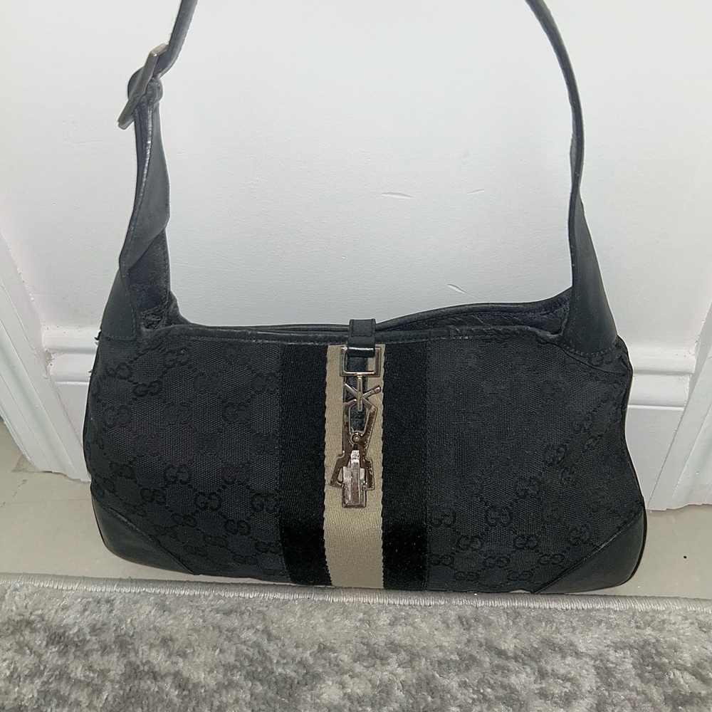 Gucci Jackie, shoulder back Black and Tan hobo bag